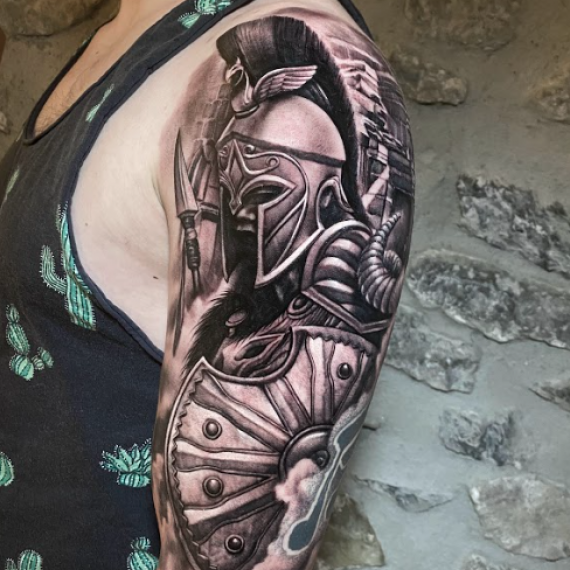 Black and grey arm tattoo zurich